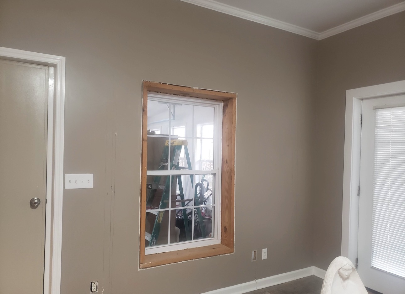 Bedroom with raw pine walls before painting